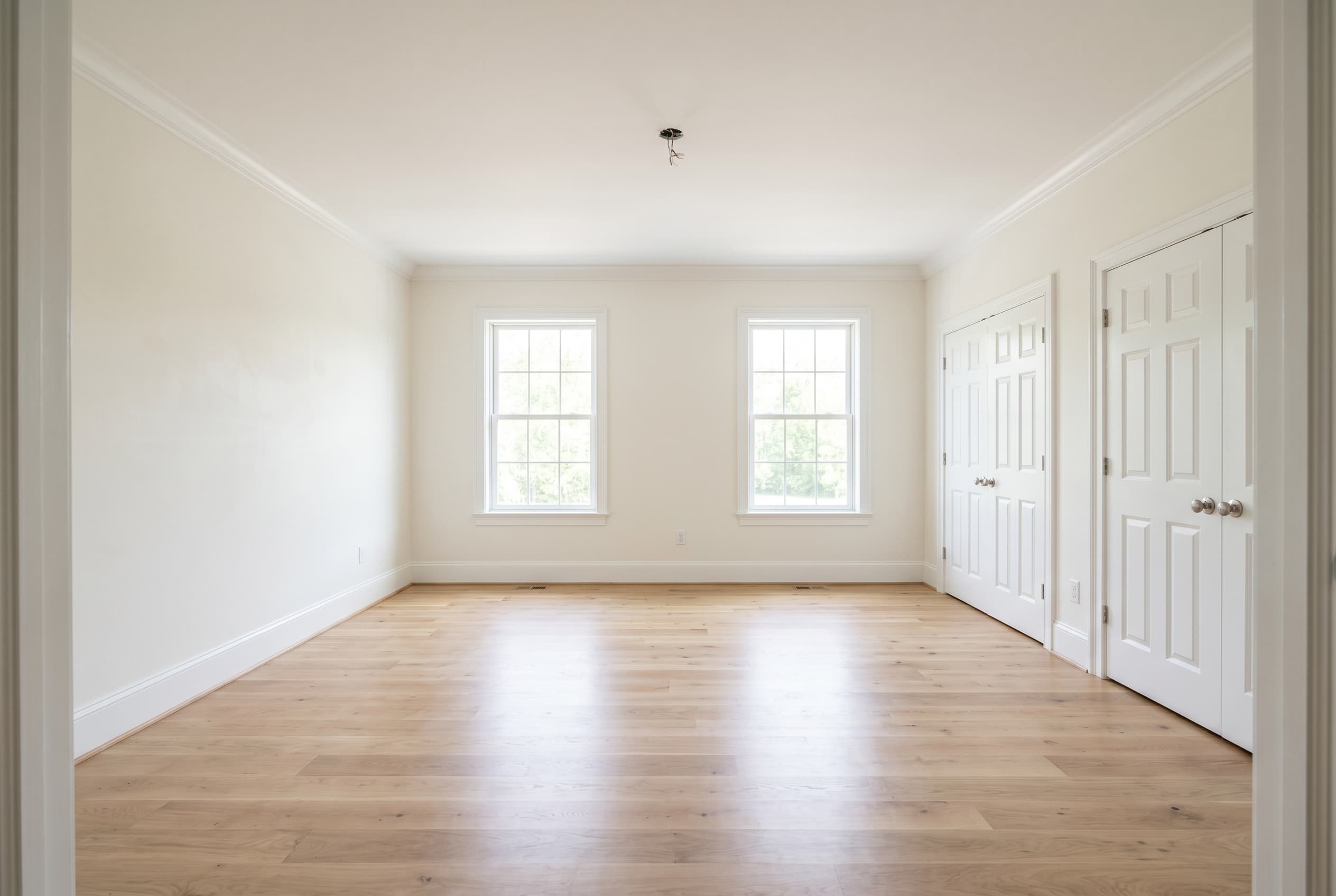 Primary bedroom before staging
